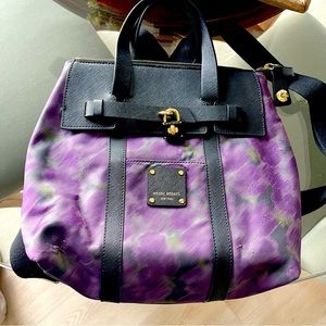 Henri Bendel Jetsetter Backpack purse in purple/black